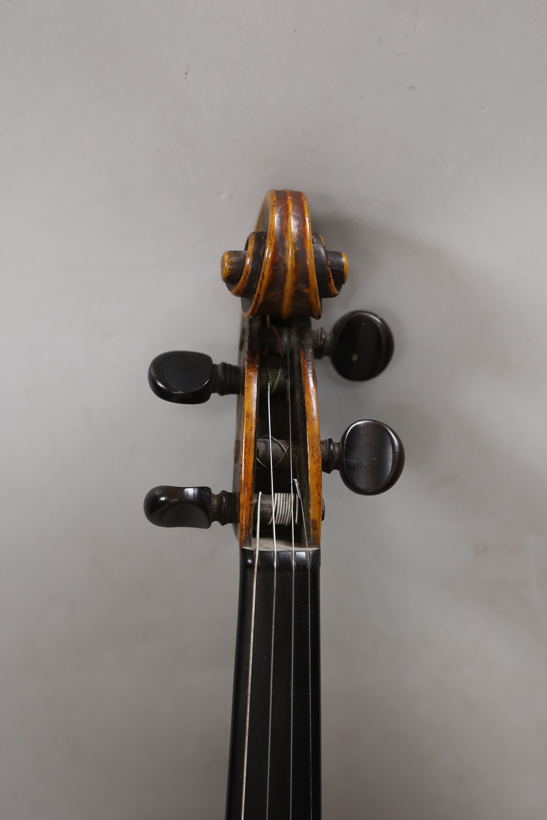 A Vuillaume violin with a bow, in case, back measures 36cm excl button